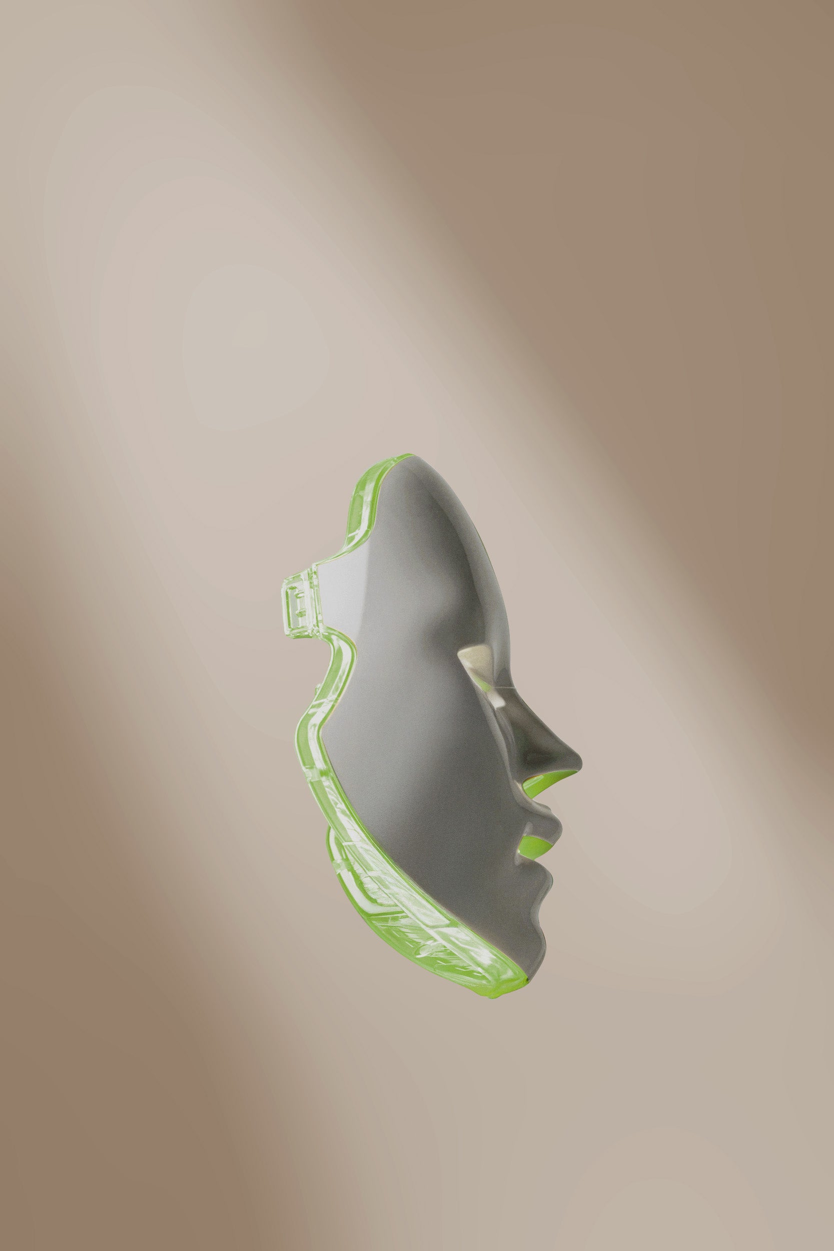 The PRO mask in profile, edged with green light