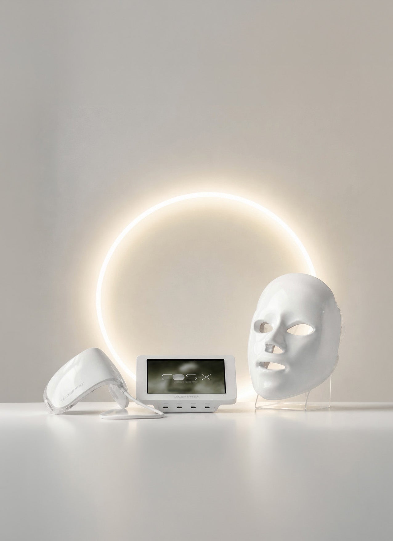 The EOS-X system beneath a halo light, eye device, controller and mask